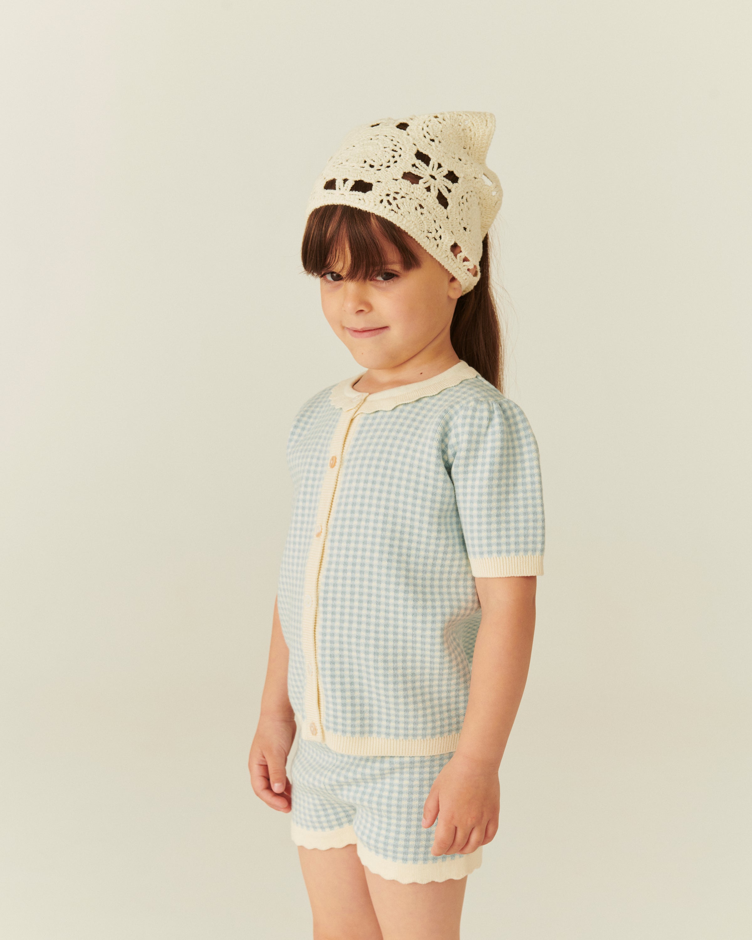 Copenhagen Colors kids check jacquard cotton shorts in blue, styled with matching cardigan