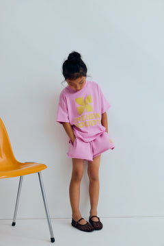 The New Society kids logo t-shirt in pink lavender