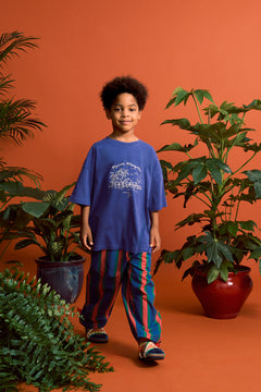 Maison Mangostan kids tropical striped pants