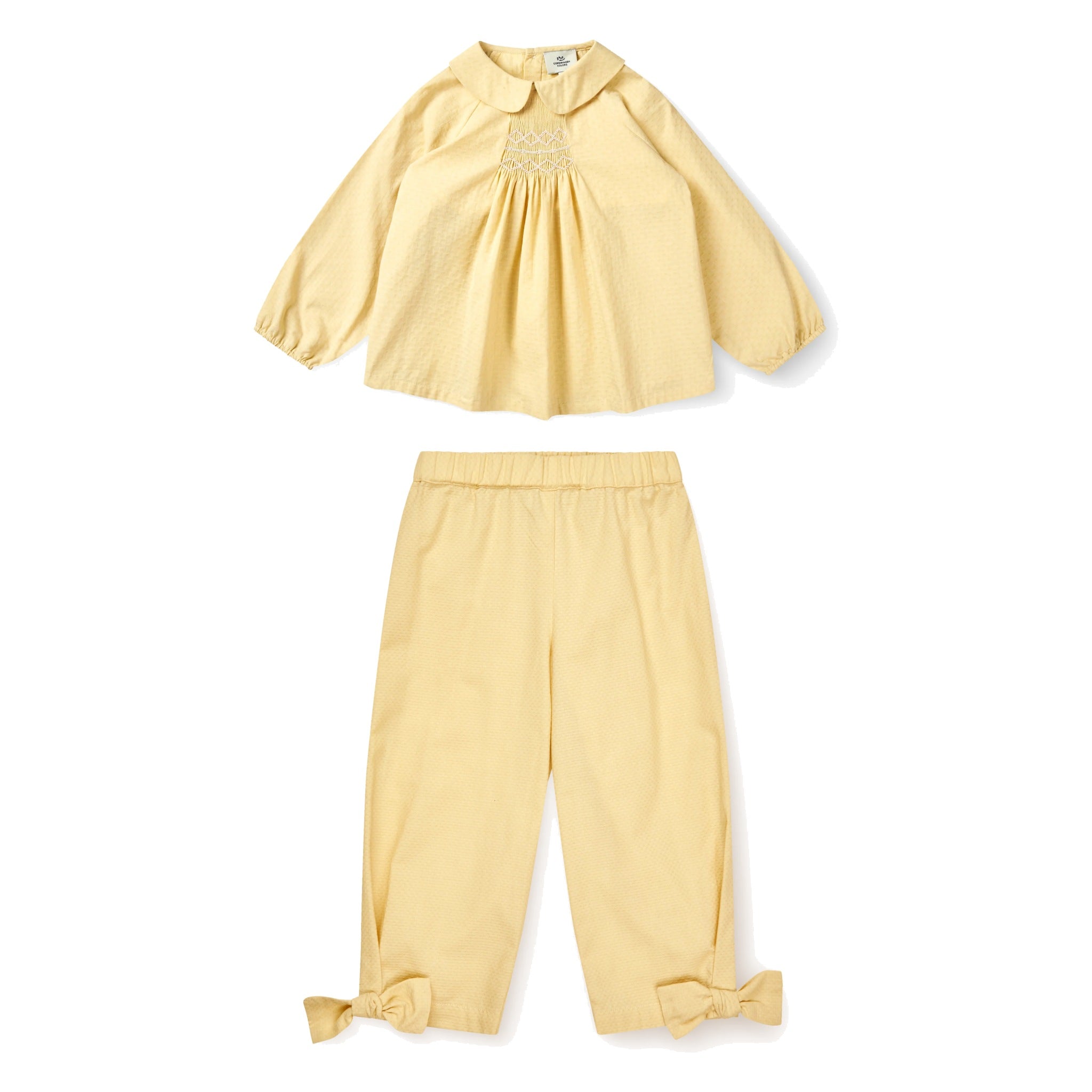 Girls' Organic Cotton Smocked Blouse & Bow Pants Set in Pale Yellow by Copenhagen Colors